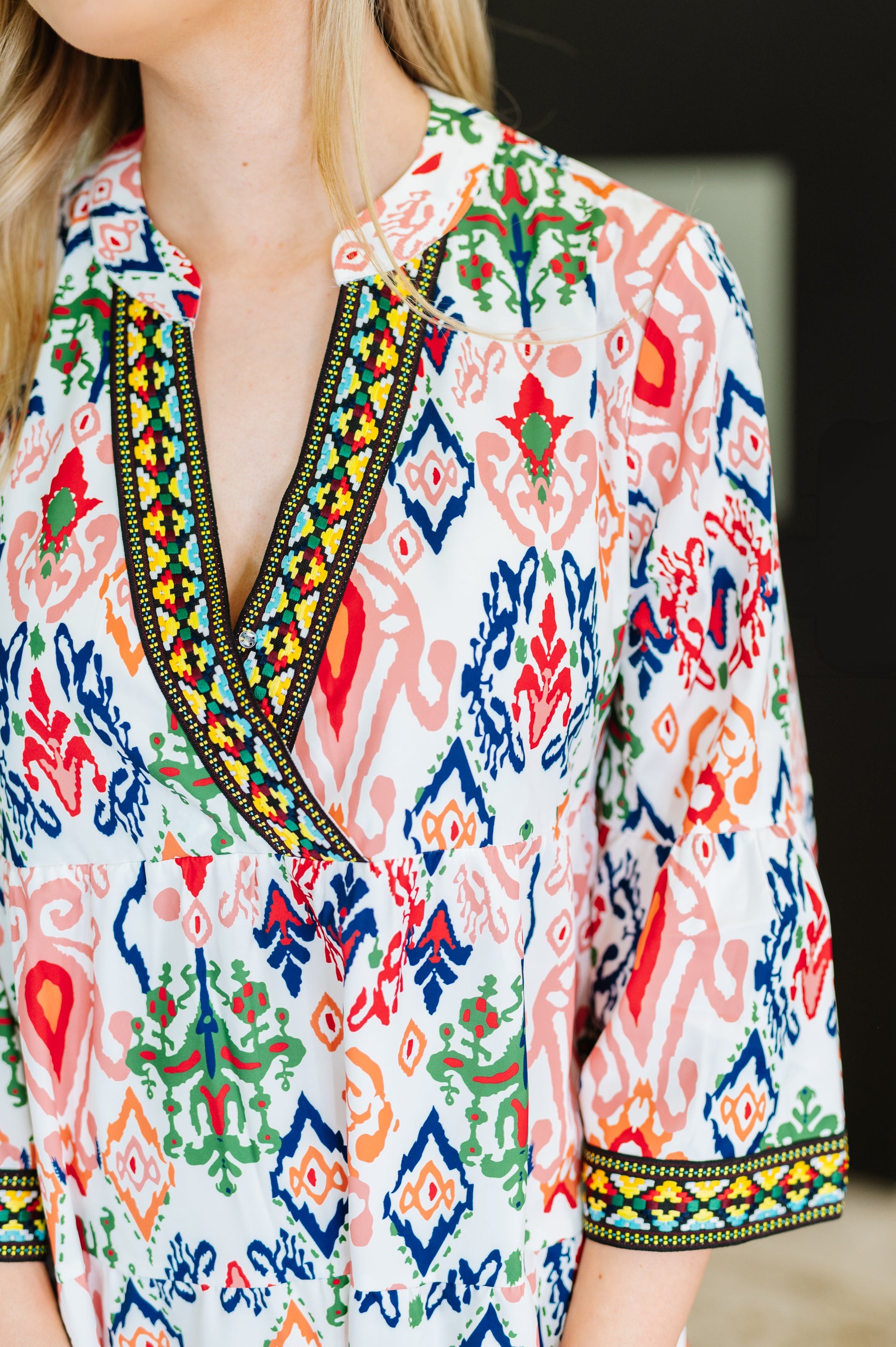 Boho Tiered Dress
Poplin Woven
No Stretch
Criss-Cross V-Neckline
Bell Sleeve
Machine Embroidered Details
Functional Side Pockets
Gathered Tiers
100% Polyester
True to Size