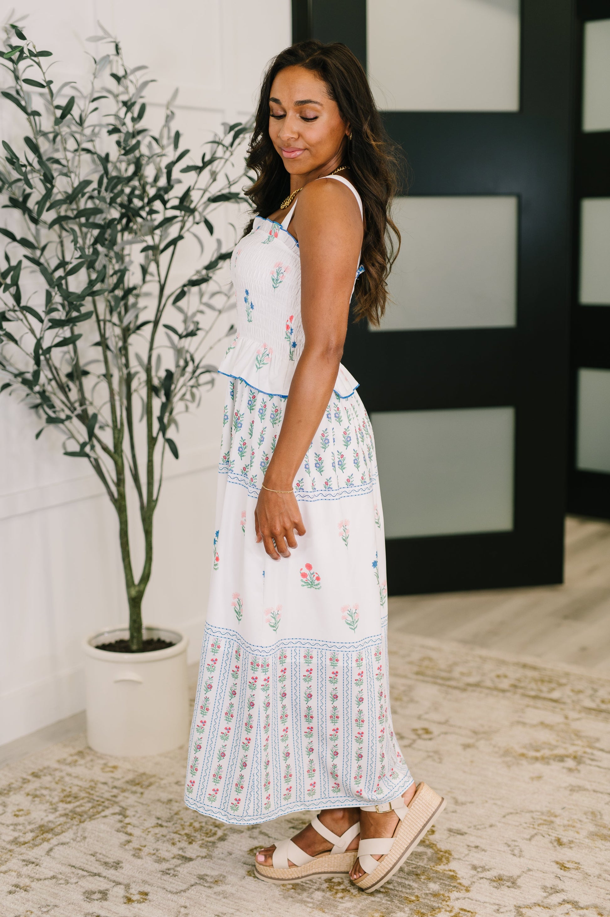 White dress with floral patterns 
Poplin Woven
Smocked Elastic Bodice
Ruffle Details
Functional Side Pocket
3/4 Lined
100% Polyester
True to Size