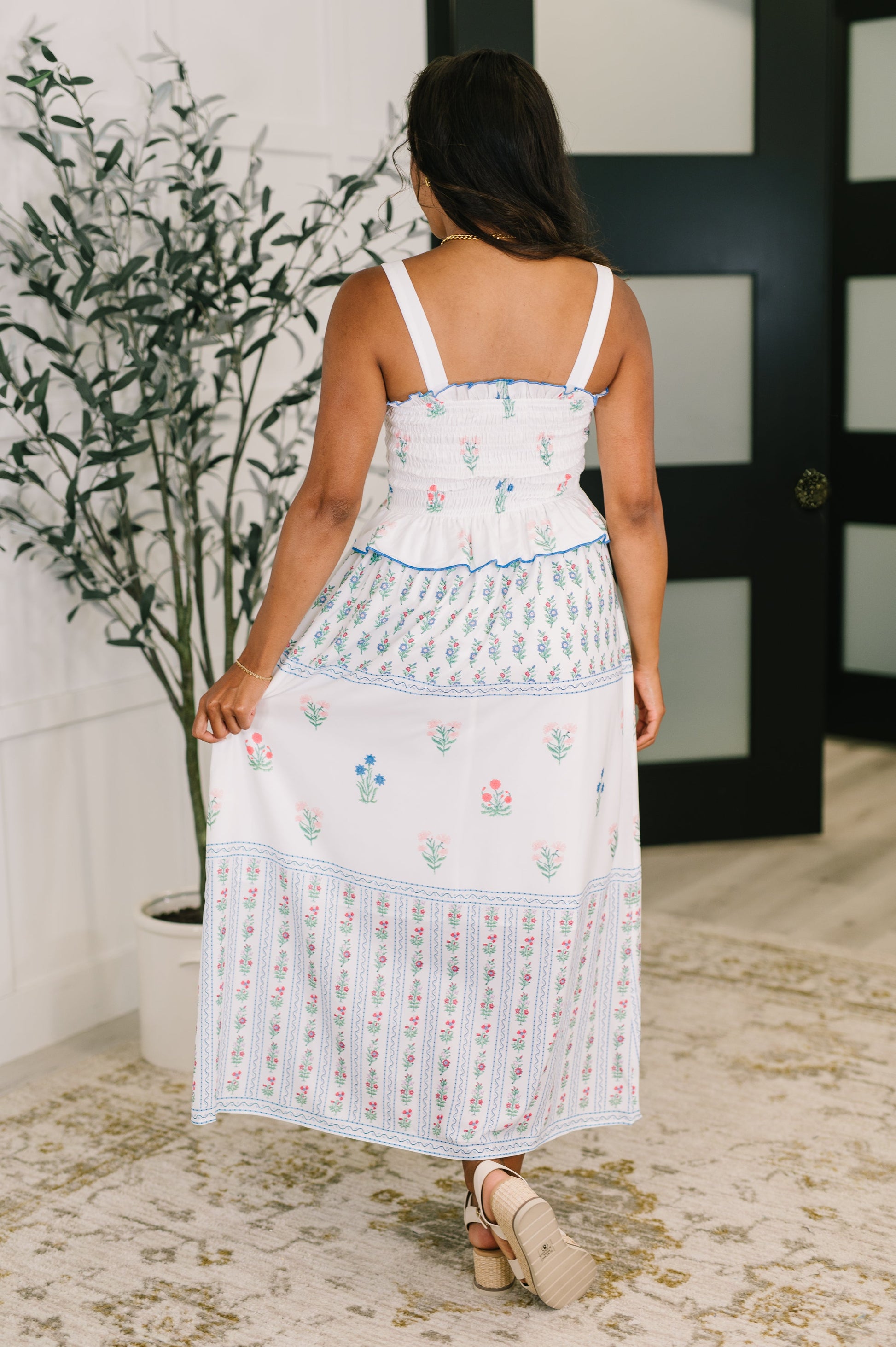 White dress with floral patterns 
Poplin Woven
Smocked Elastic Bodice
Ruffle Details
Functional Side Pocket
3/4 Lined
100% Polyester
True to Size