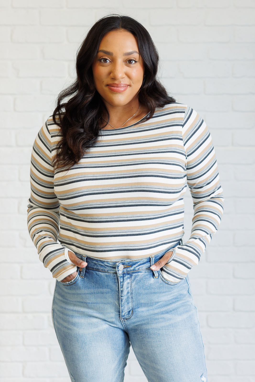 Long sleeve striped top by White Birch
Ribbed Knit
Round Neckline
Long Sleeve
Thumbholes
Side Slits
57% Polyester, 39% Rayon, 4% Spandex
True to Size
