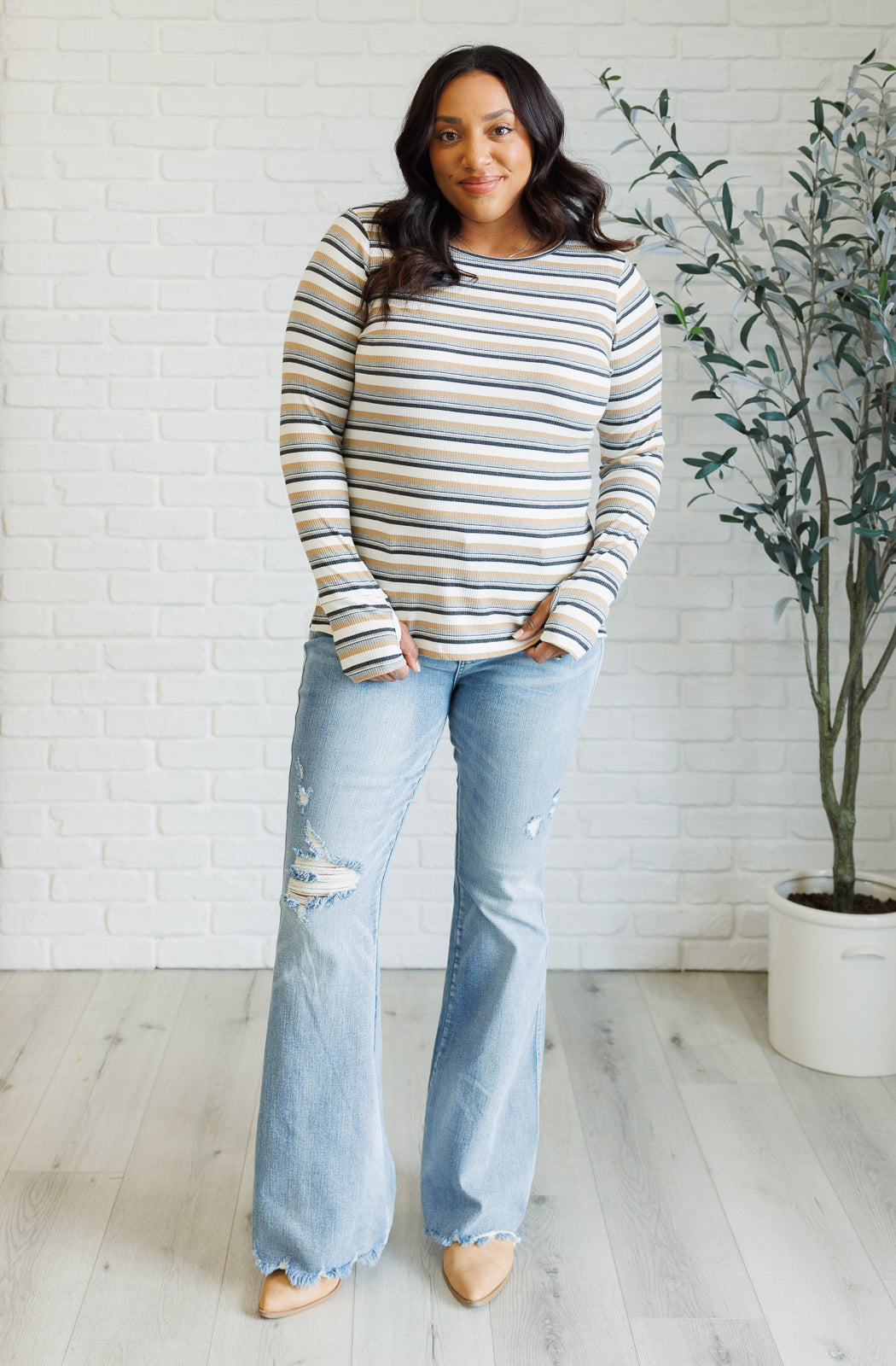 Long sleeve striped top by White Birch
Ribbed Knit
Round Neckline
Long Sleeve
Thumbholes
Side Slits
57% Polyester, 39% Rayon, 4% Spandex
True to Size