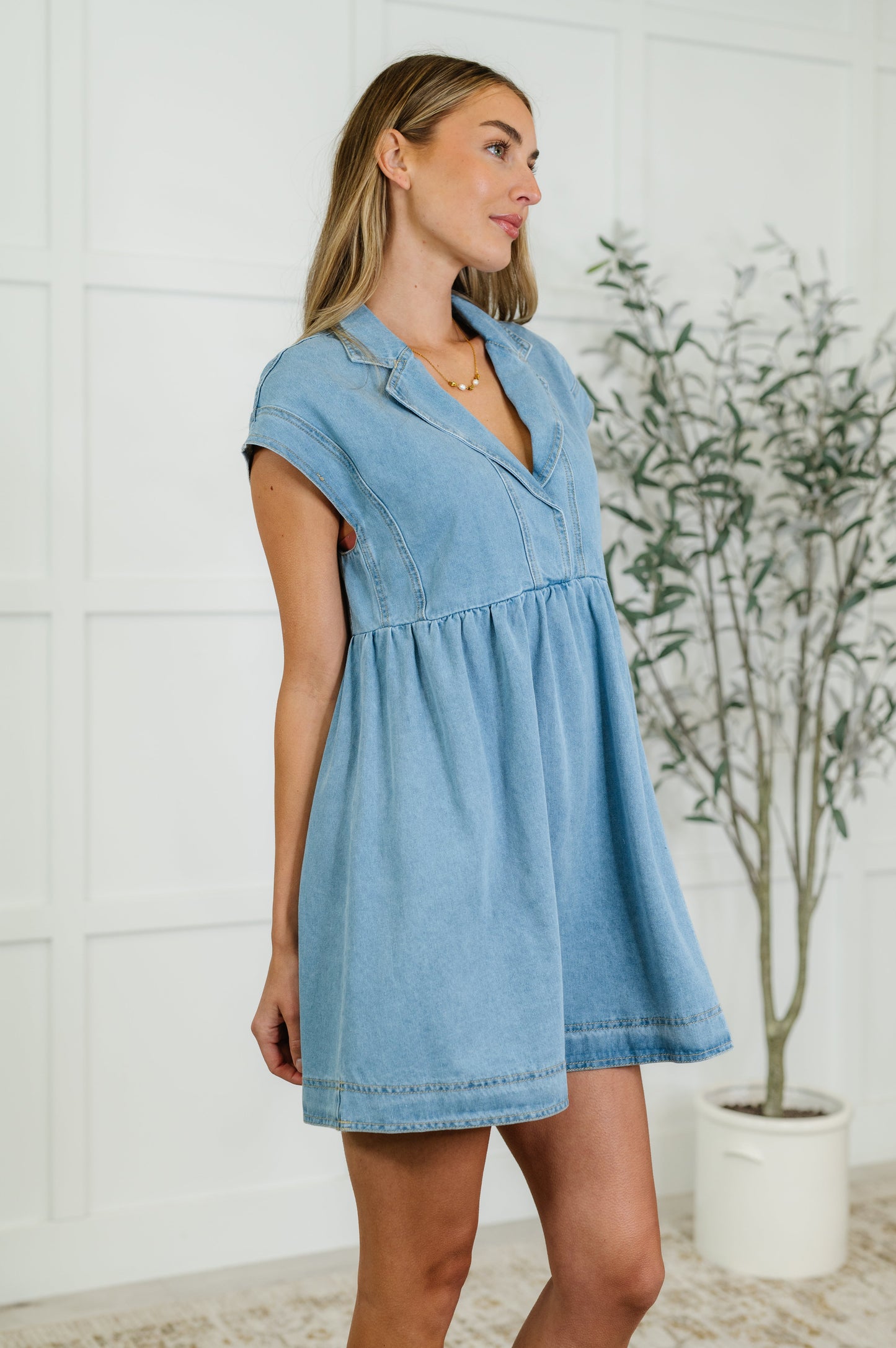 Denim, Mid-Weight Twill mini dress
Collared V-Neckline
Snap Button Closure
Waistband Seam
82% Cotton, 10% Polyester, 8% Viscose
True to Size