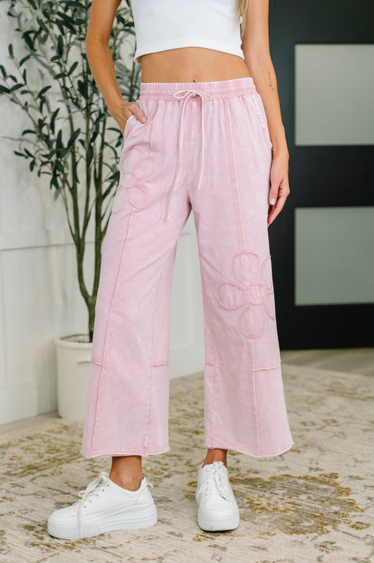 Light Pink cropped flare pants with flower applique design