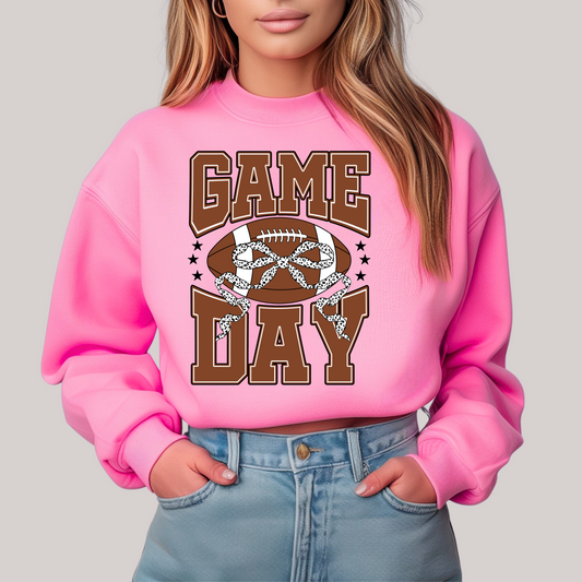 Pink sweatshirt with 'Game Day' and football graphic 