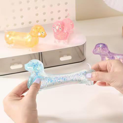 Stretchy glitter dachshund squishy toy being pulled for sensory play