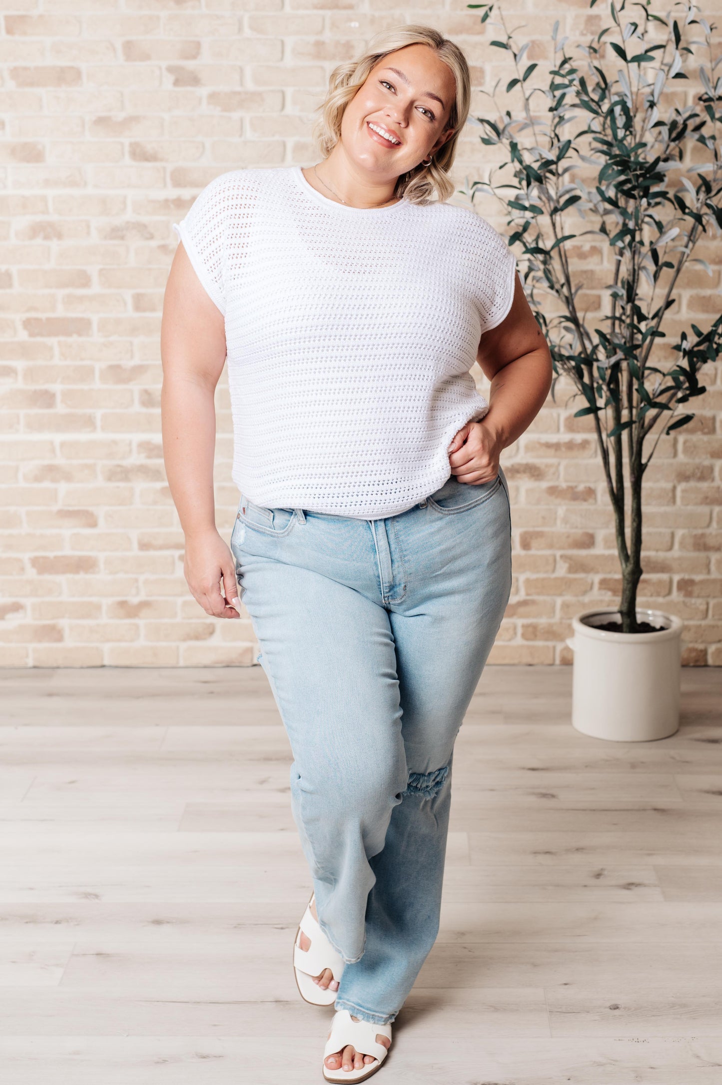 White Lightweight Sweater Knit
Ribbed Round Neckline
Dolman Sleeve
Ribbed Sleeve Cuff
60% Cotton, 40% Acrylic
True to Size short sleeve top