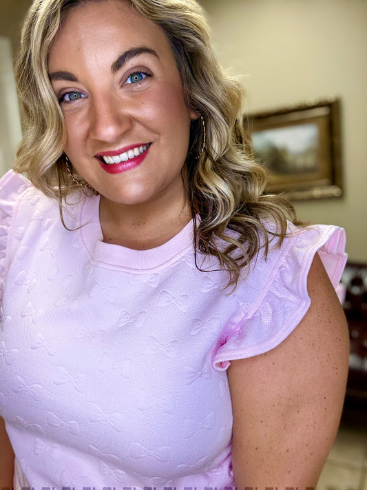 Light Pink top with ruffled sleeves with shorts