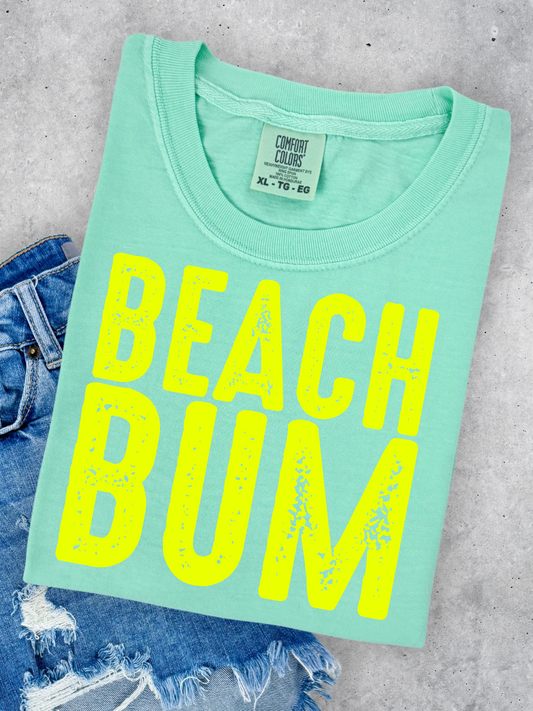Beach Bum gaphic tee
Comfort Colors 100% Cotton
Garment-dyed soft ring spun fabric
Crew Neck short sleeve unisex tee
Multicolor DTF printing on crewneck