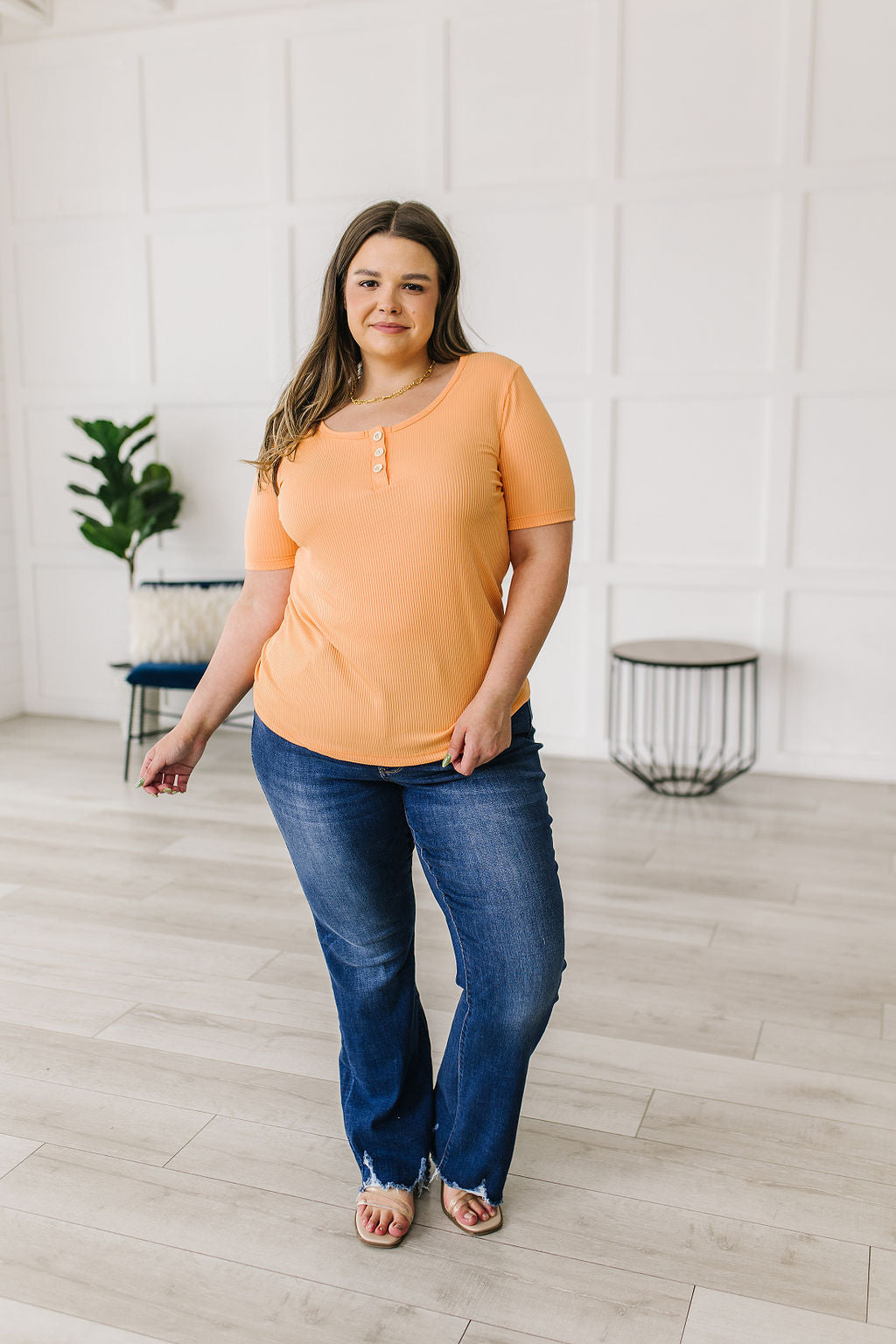 Ribbed Jersey Knit, short sleeve top in light Orange
Decorative Buttons
Scoop Neckline
Slim Fit
95% Polyester, 5% Spandex
True to Size