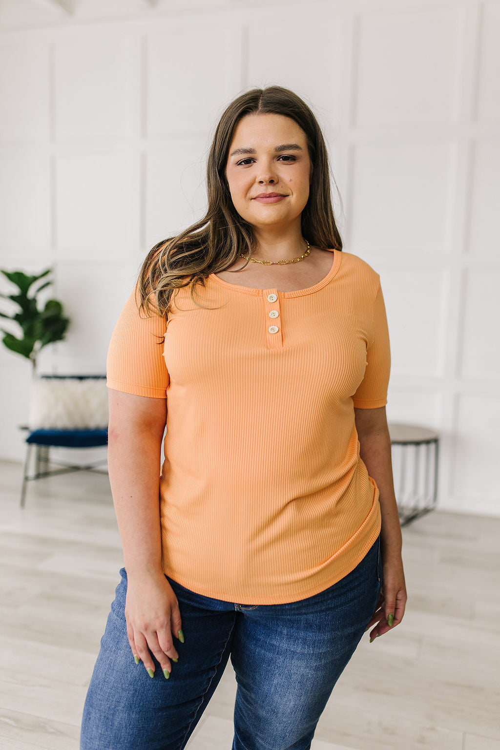 Ribbed Jersey Knit, short sleeve top in light Orange
Decorative Buttons
Scoop Neckline
Slim Fit
95% Polyester, 5% Spandex
True to Size