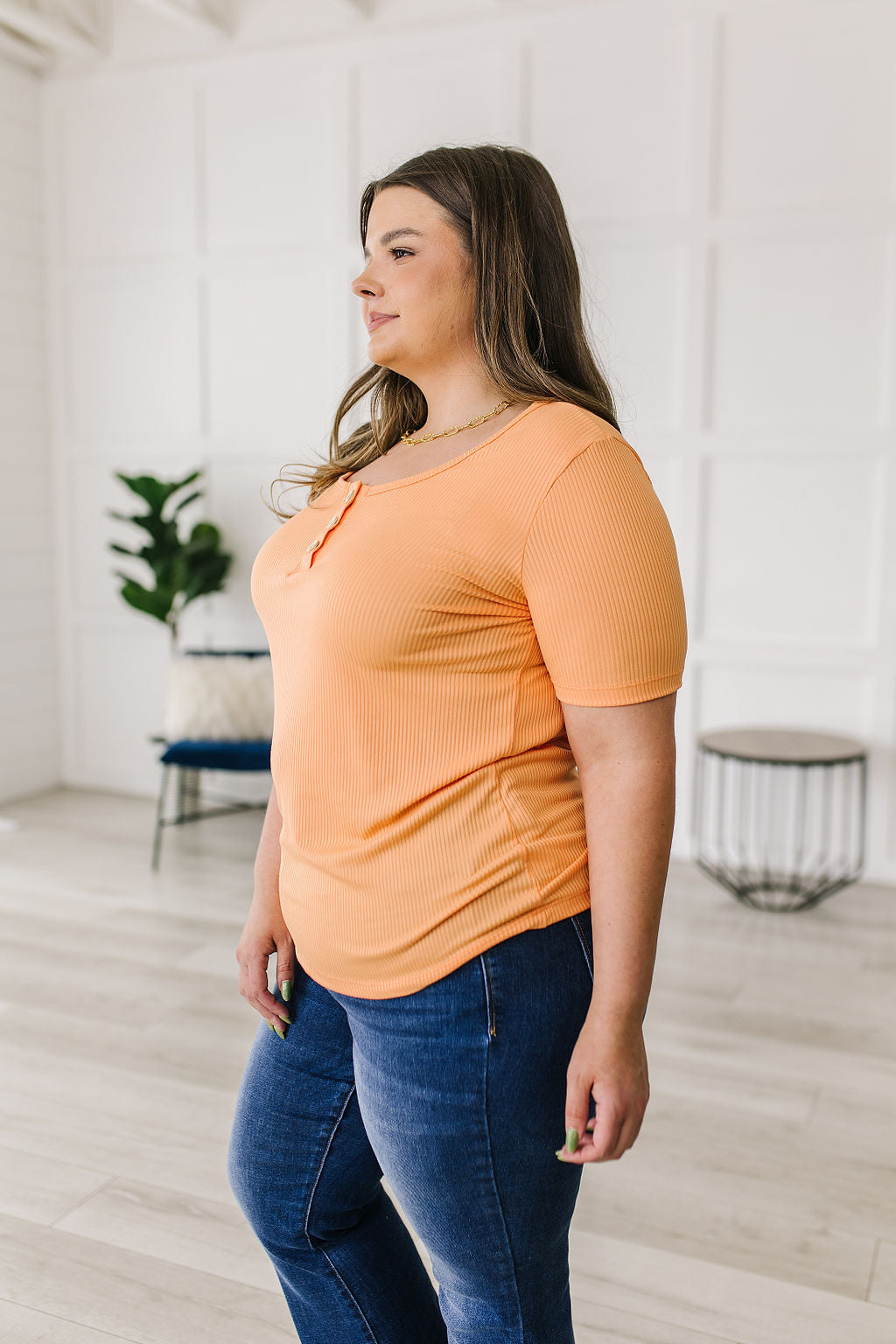 Ribbed Jersey Knit, short sleeve top in light Orange
Decorative Buttons
Scoop Neckline
Slim Fit
95% Polyester, 5% Spandex
True to Size