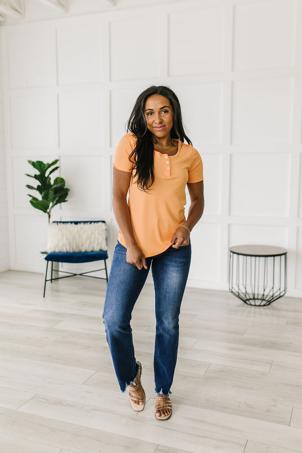 Ribbed Jersey Knit, short sleeve top in light Orange
Decorative Buttons
Scoop Neckline
Slim Fit
95% Polyester, 5% Spandex
True to Size