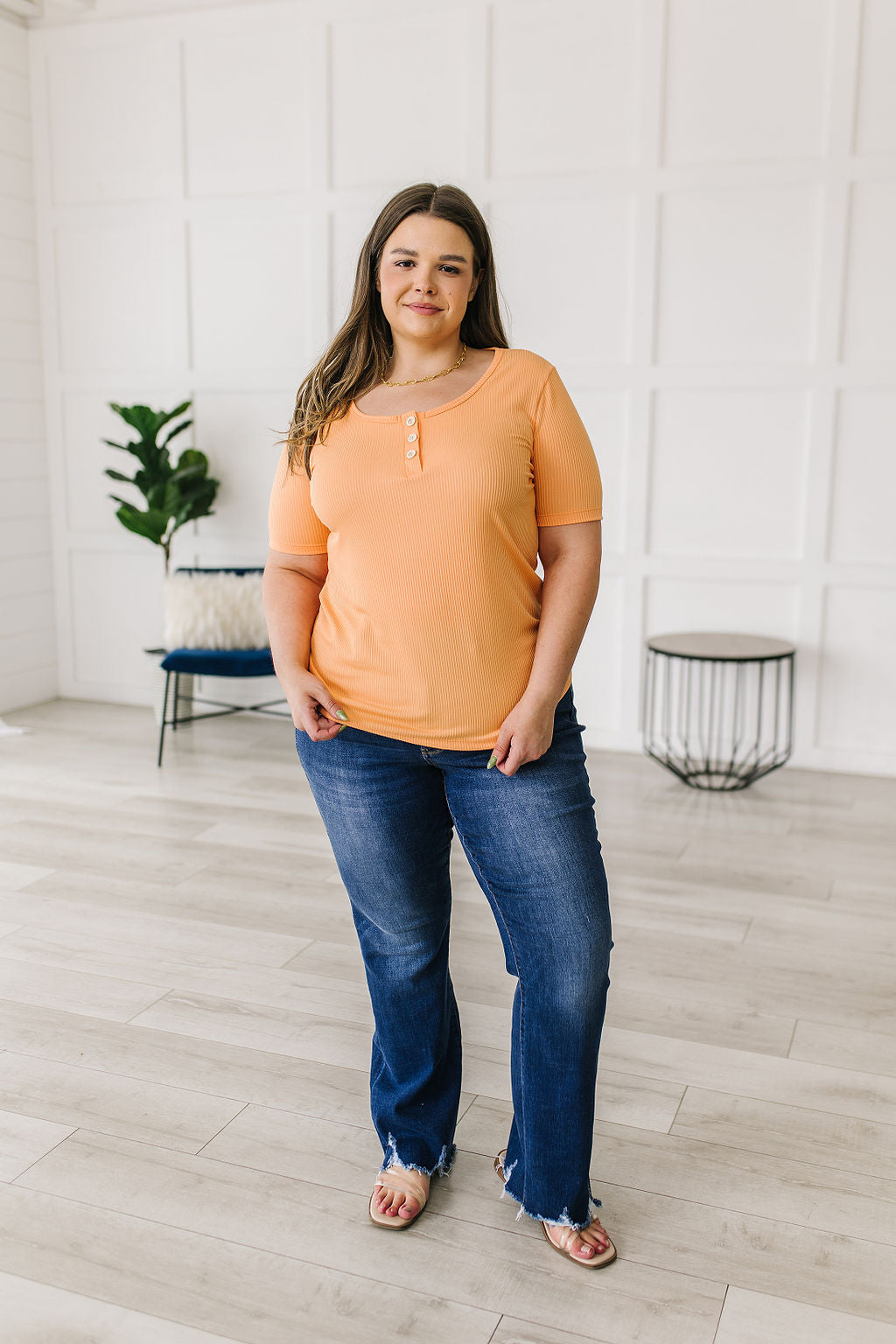 Ribbed Jersey Knit, short sleeve top in light Orange
Decorative Buttons
Scoop Neckline
Slim Fit
95% Polyester, 5% Spandex
True to Size