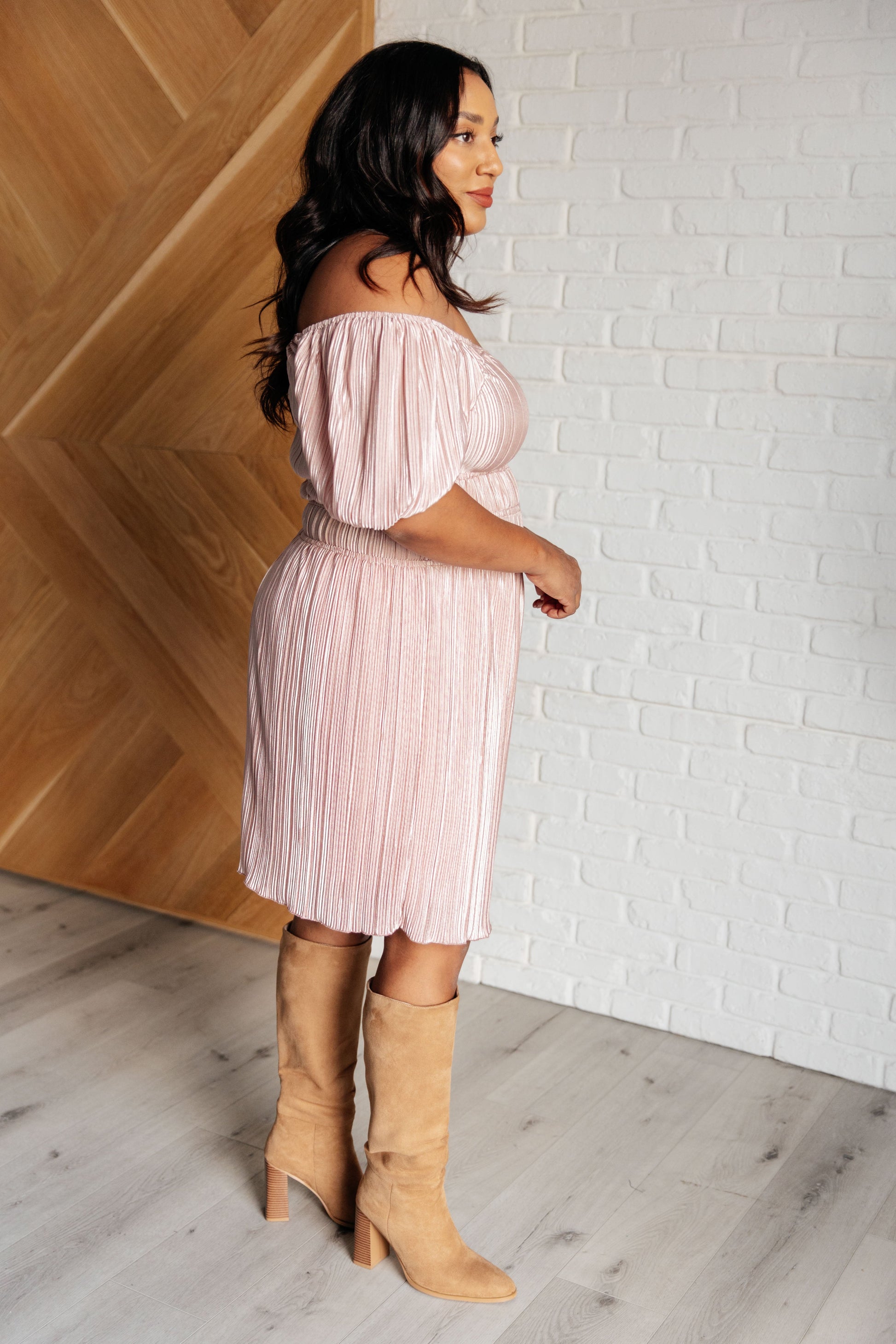 Pink Poly Satin short sleeved dress
Plisse
Cased Elastic Shoulder
Scoop Neck/Off Shoulder
Balloon Sleeve
Cased Elastic Sleeve Cuff
Cased Elastic Waistline
Lined Skirt
Self and Lining: 100% Polyester
True to Size