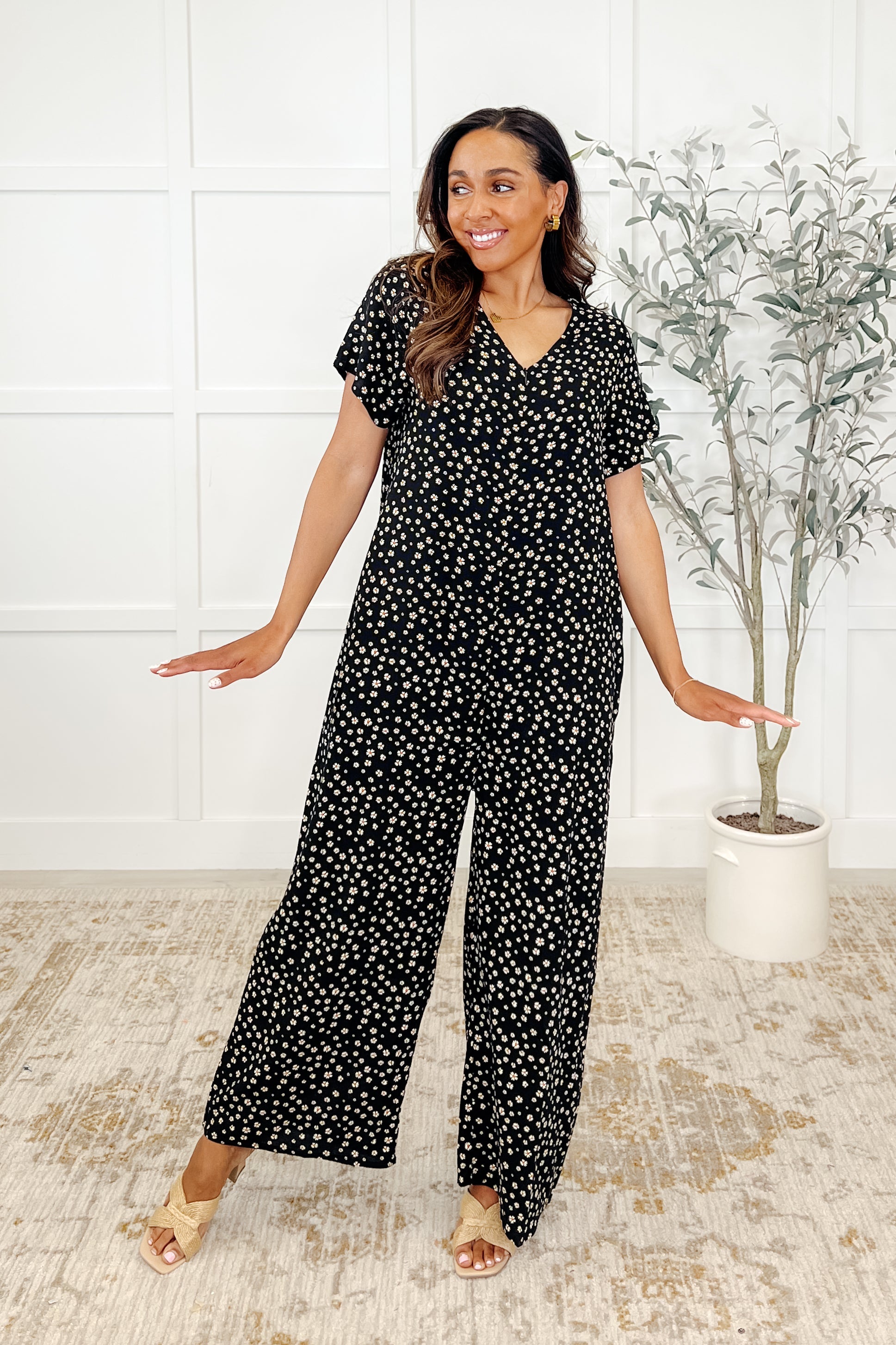 Black V neck, front zipper, relaxed fit, wide leg, side pockets, plus size jumpsuit