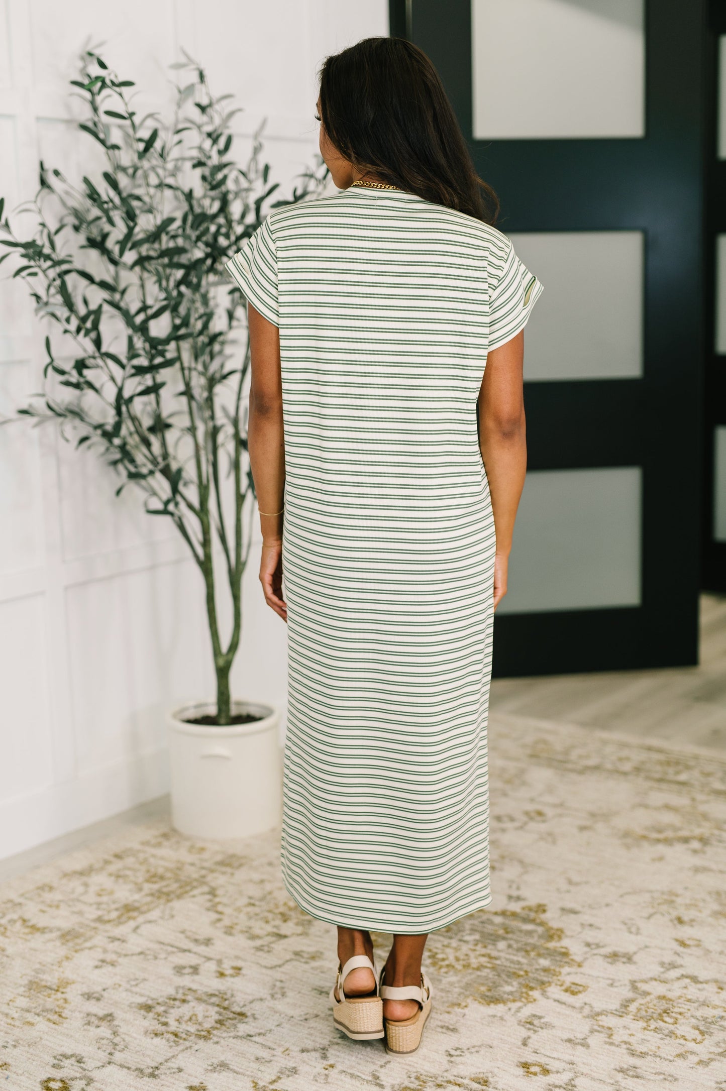  Green and white striped dress 
Ribbed Knit
High Stretch
Banded, Round Neckline
Cuffed and Tacked Sleeve
Side Slit
95% Polyester, 5% Spandex
True to Size
