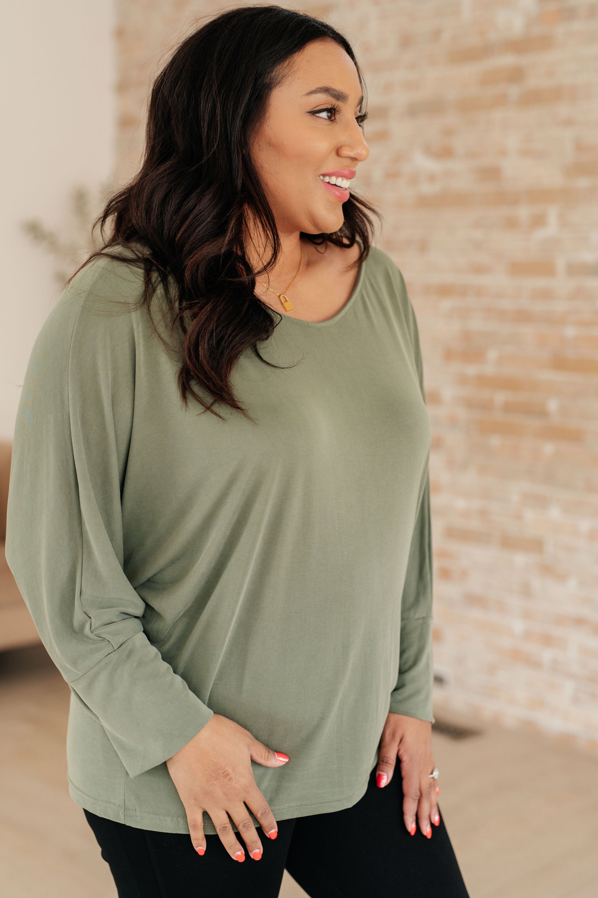 Brushed Microfiber in Olive by Sew In Love
Boat Neckline
Dolman Sleeve
Exaggerated Sleeve Cuff
70% Modal, 30% Polyester
True to Size