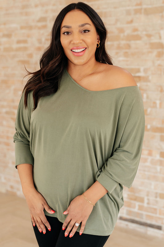 Brushed Microfiber in Olive by Sew In Love
Boat Neckline
Dolman Sleeve
Exaggerated Sleeve Cuff
70% Modal, 30% Polyester
True to Size