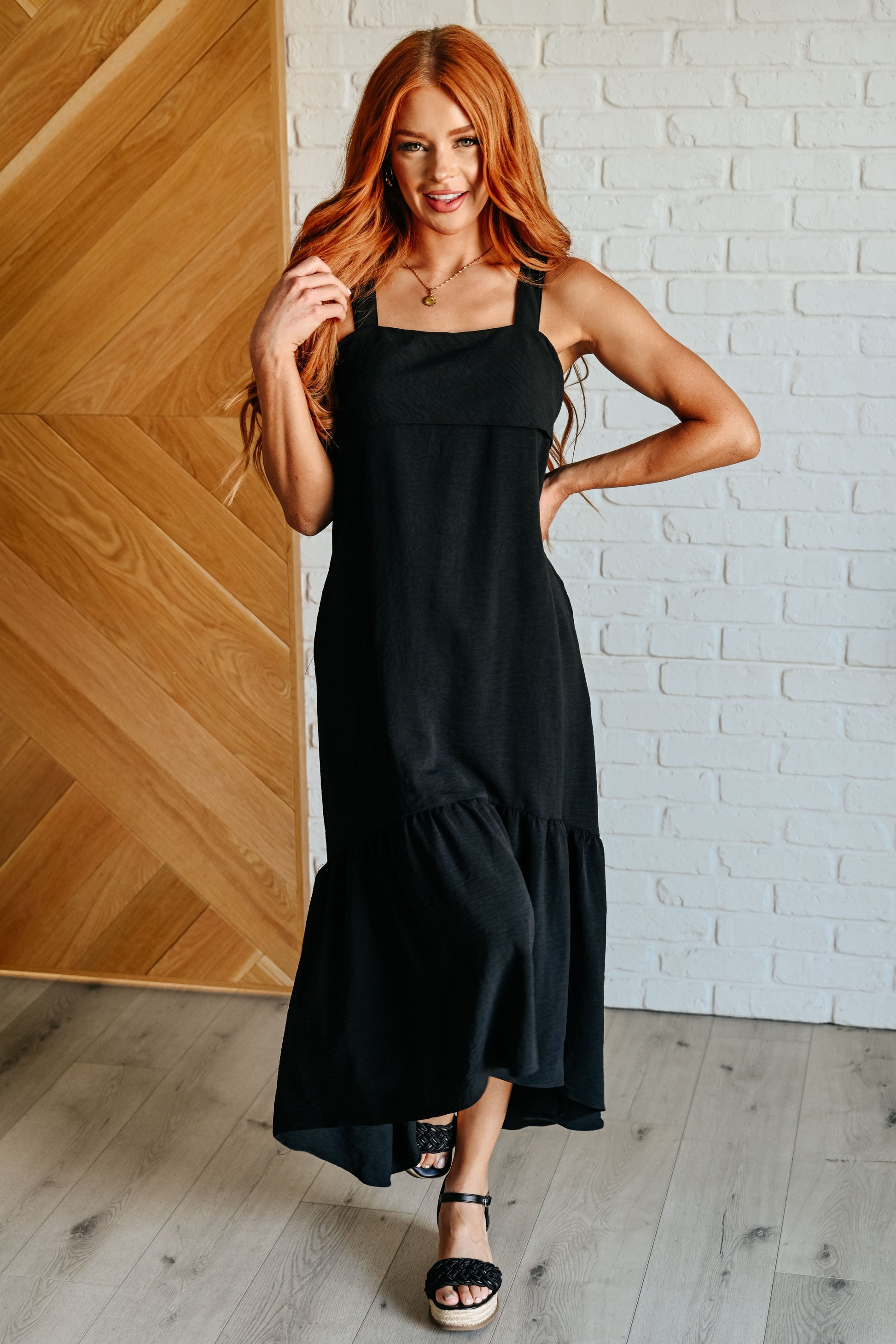 A black tie back maxi dress with a high low hem by Jodifil
Crinkle Woven
Back Tie
Bottom Ruffle
High Low Scooped Hem
Side Pockets
100% Polyester
True to Size
