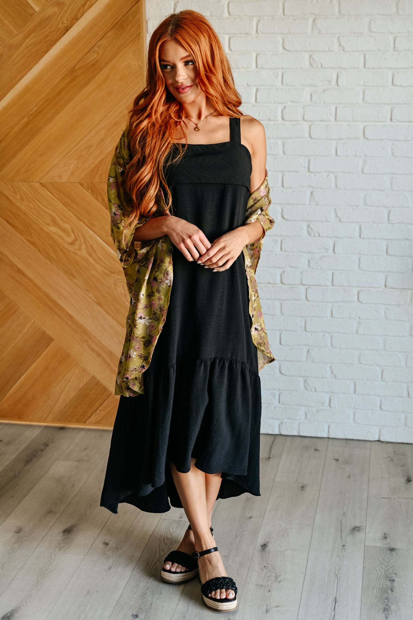 A black tie back maxi dress with a high low hem by Jodifil
Crinkle Woven
Back Tie
Bottom Ruffle
High Low Scooped Hem
Side Pockets
100% Polyester
True to Size
