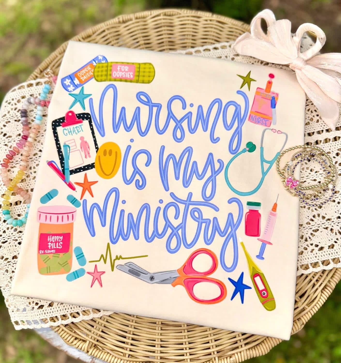 Nursing is My Ministry shirt with medical-themed illustrations and bright typography