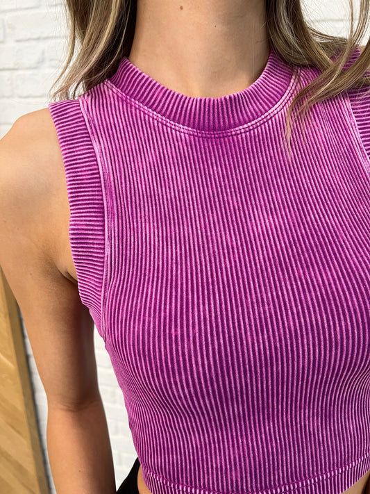 Cropped Ribbed Tank in Lt Plum
Ribbed Knit
Banded Round Neckline
Sleeveless
Cropped
Built in Shelf Bra
Removable Cups
90% Nylon, 10% Spandex
Runs Small
Recommended to Size Up
