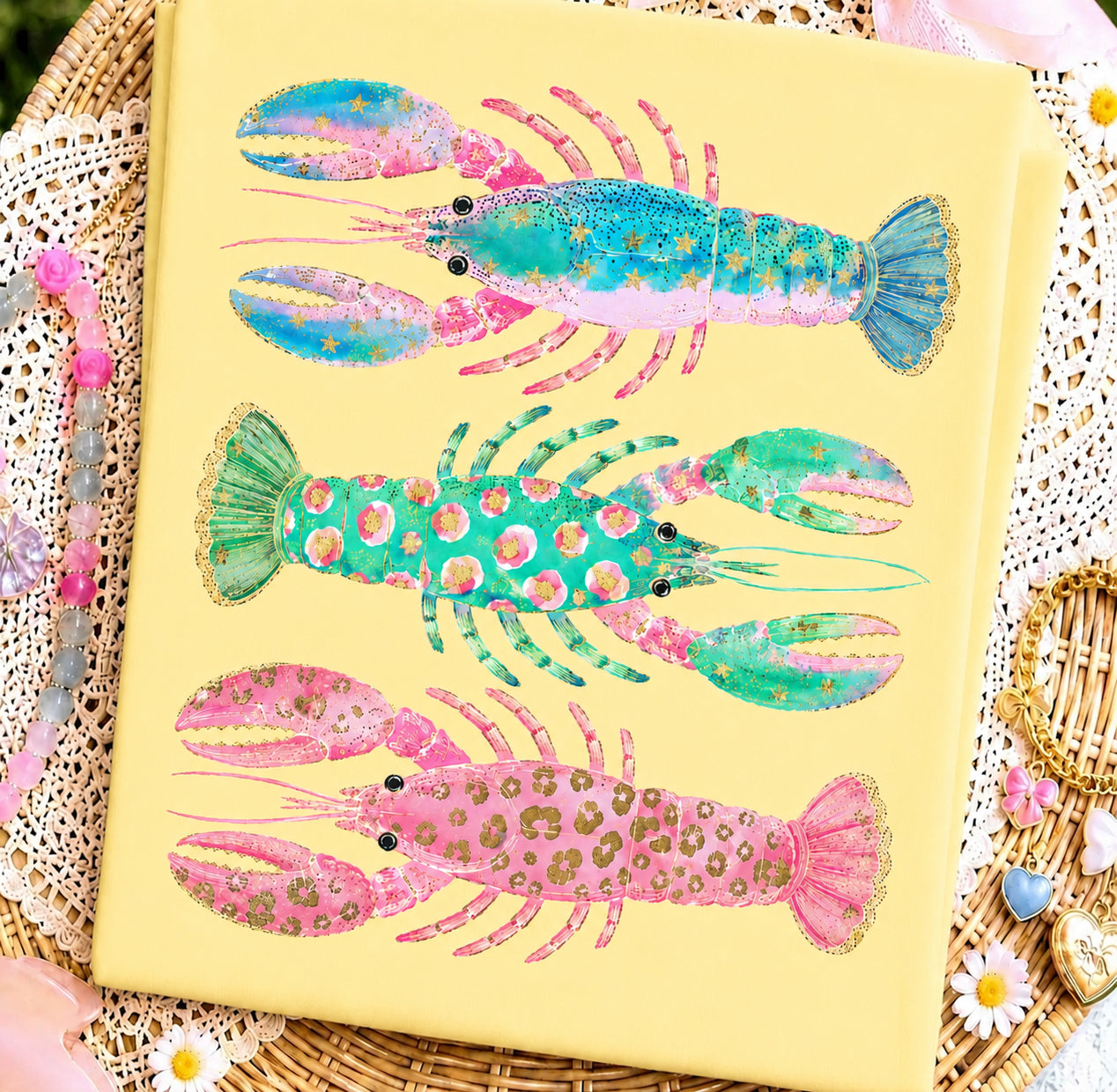 Preppy leopard girlie lobster graphic tee in butter yellow with colorful pink, turquoise, and green coastal lobster design