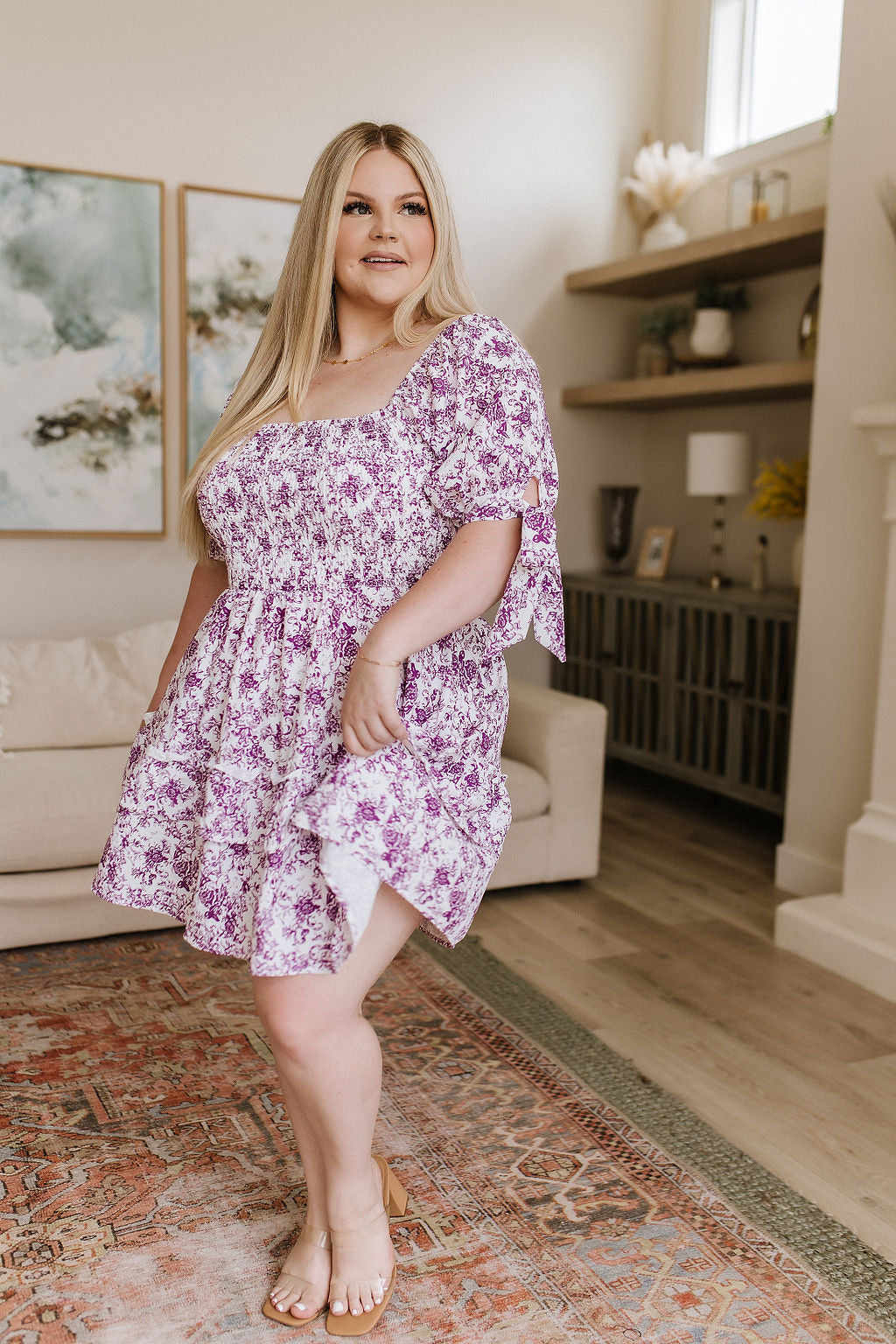 Lightweight Woven
Smocked Bodice
Elastic Neckline
Ruffled Tiered Skirt
Functional Sleeve Ties
Short Babydoll Cut
100% Polyester
True to Size floral dress by White Birch