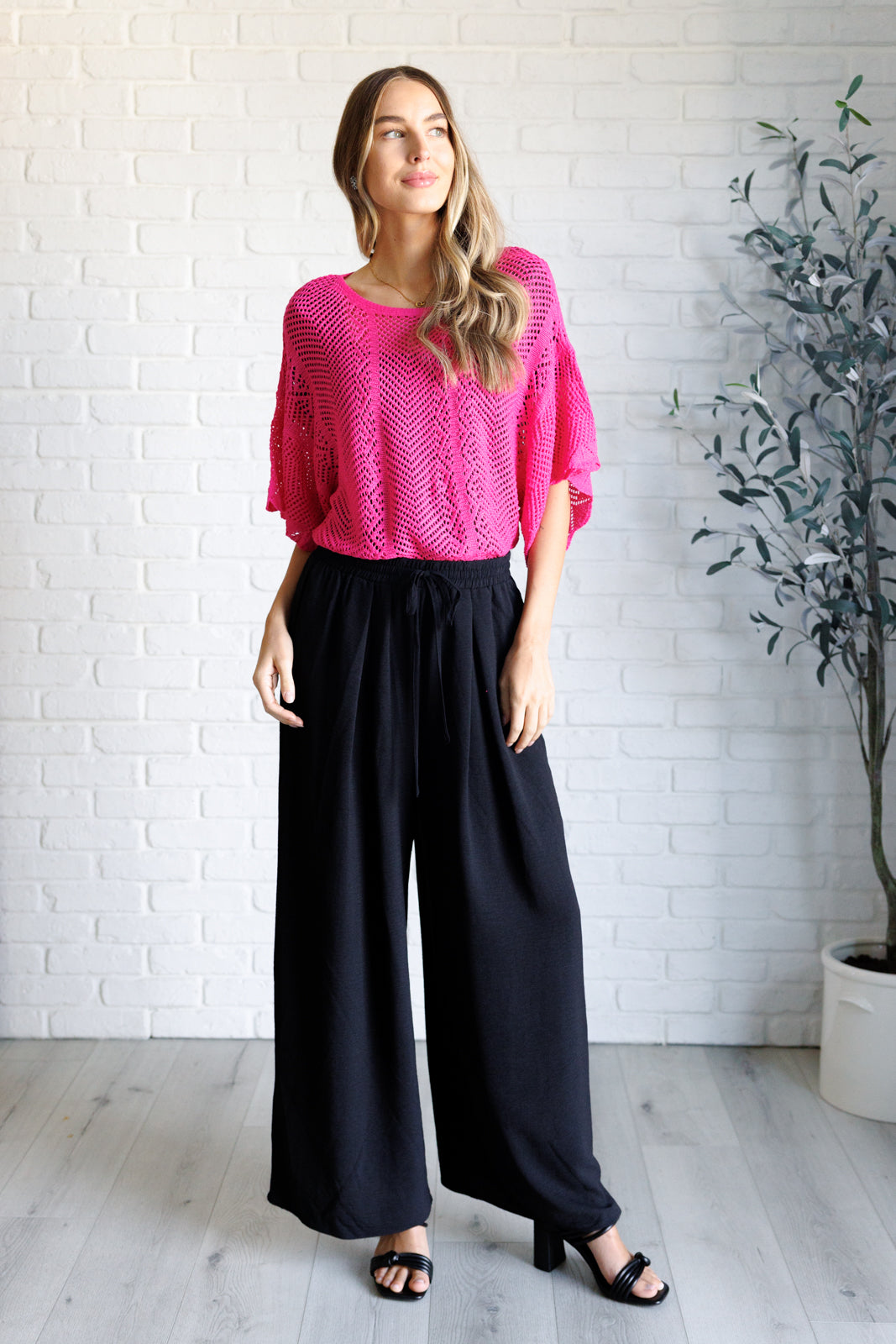 Pink open sweater knit, high stretch, drop shoulder, boat neck, scalloped sleeve cuff, boxy fit top