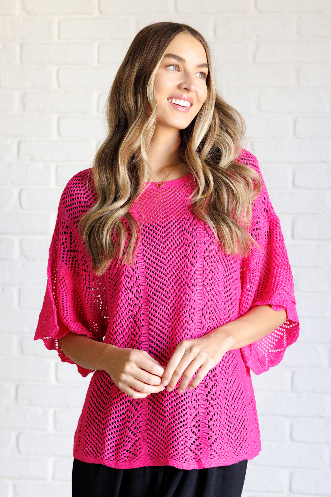 Pink open sweater knit, high stretch, drop shoulder, boat neck, scalloped sleeve cuff, boxy fit top