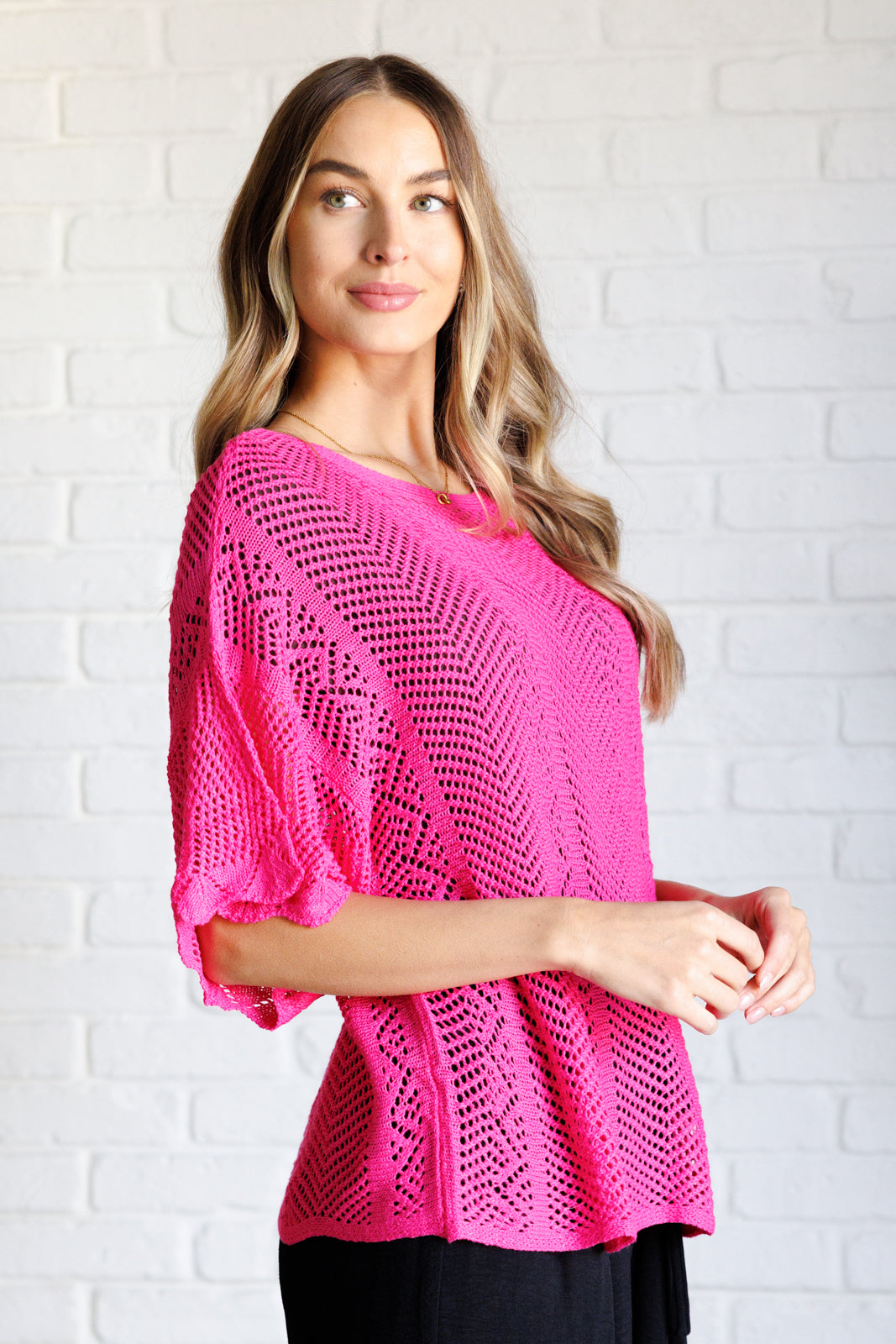 Pink open sweater knit, high stretch, drop shoulder, boat neck, scalloped sleeve cuff, boxy fit top