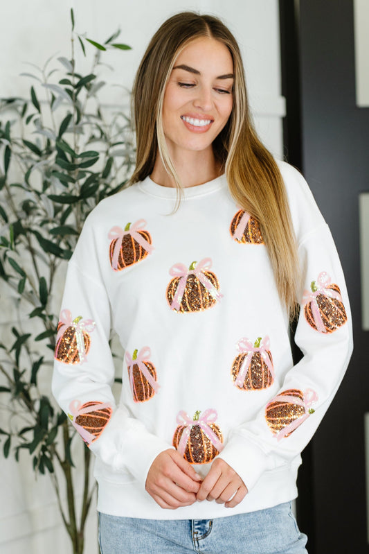 White long sleeve sequin pullover top with pumpkin patterns 
