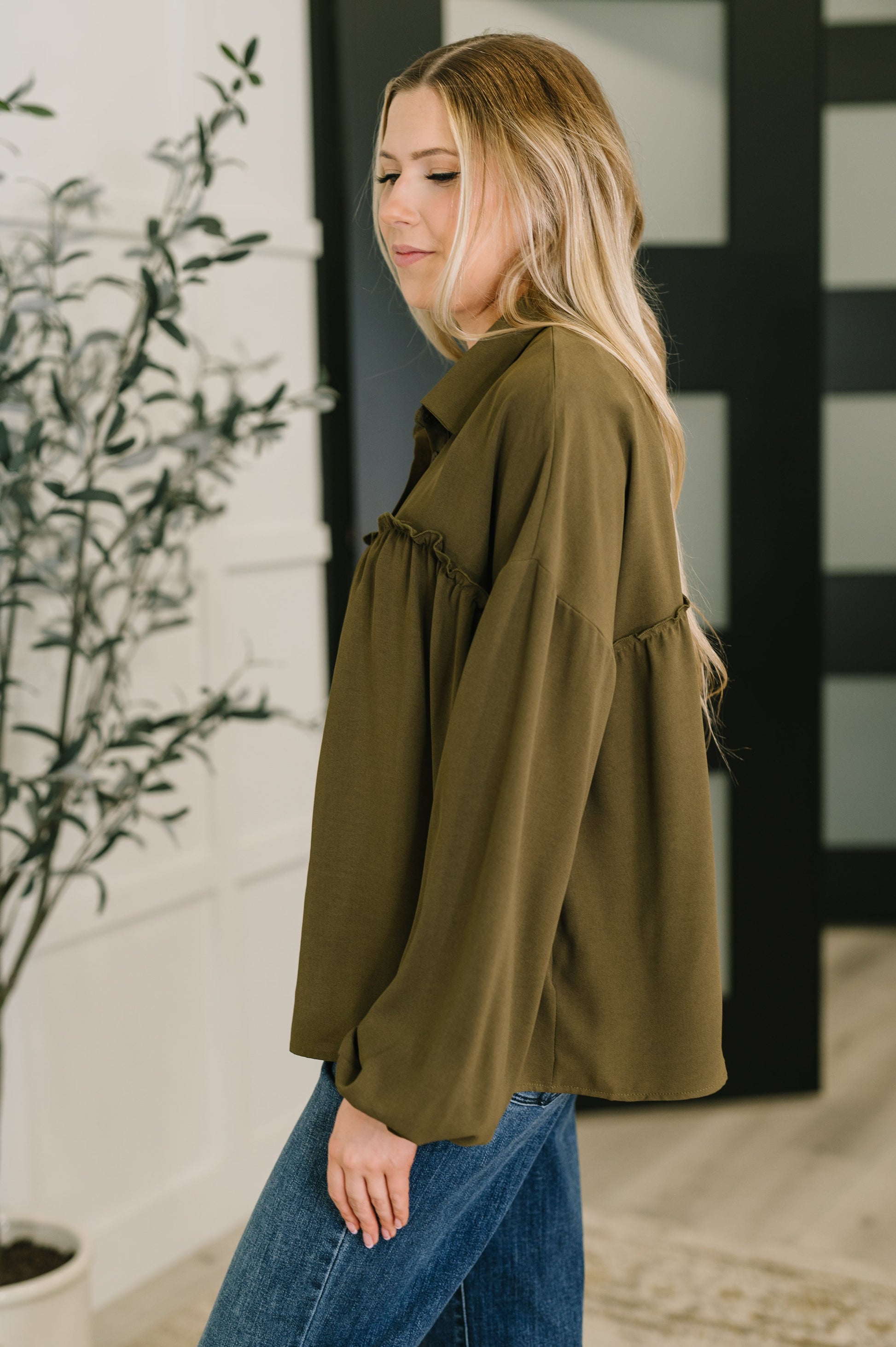 Long sleeve button down top in Olive by Andree by Unit
Woven
No-Stretch
Collared Neckline
Full Front Button Down
Cased Elastic Sleeve Cuff
Gathered, Ruffle Seam Detail
Scooped High-Low Hem
97% Polyester, 3% Spandex
True to Size