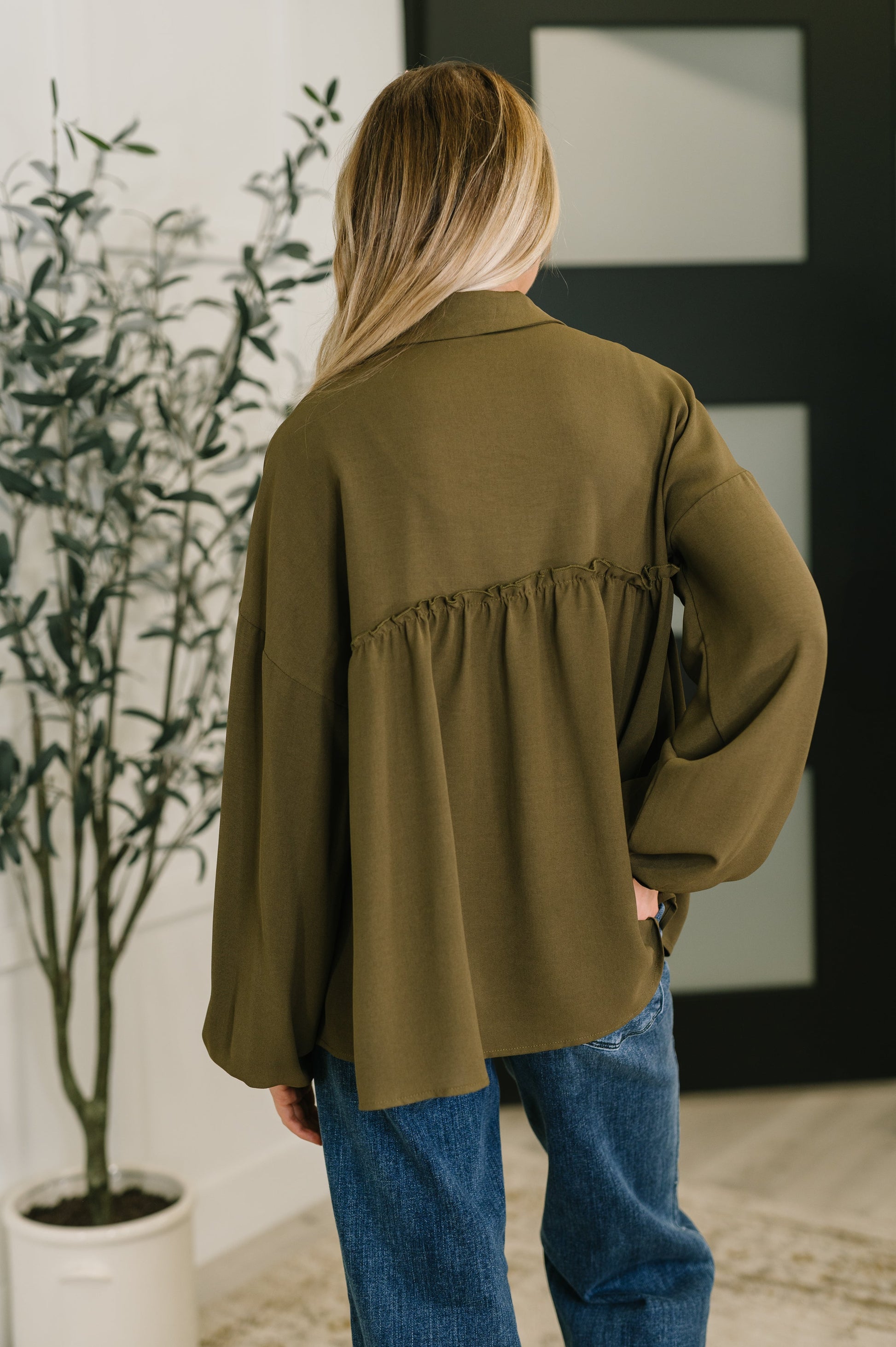 Long sleeve button down top in Olive by Andree by Unit
Woven
No-Stretch
Collared Neckline
Full Front Button Down
Cased Elastic Sleeve Cuff
Gathered, Ruffle Seam Detail
Scooped High-Low Hem
97% Polyester, 3% Spandex
True to Size