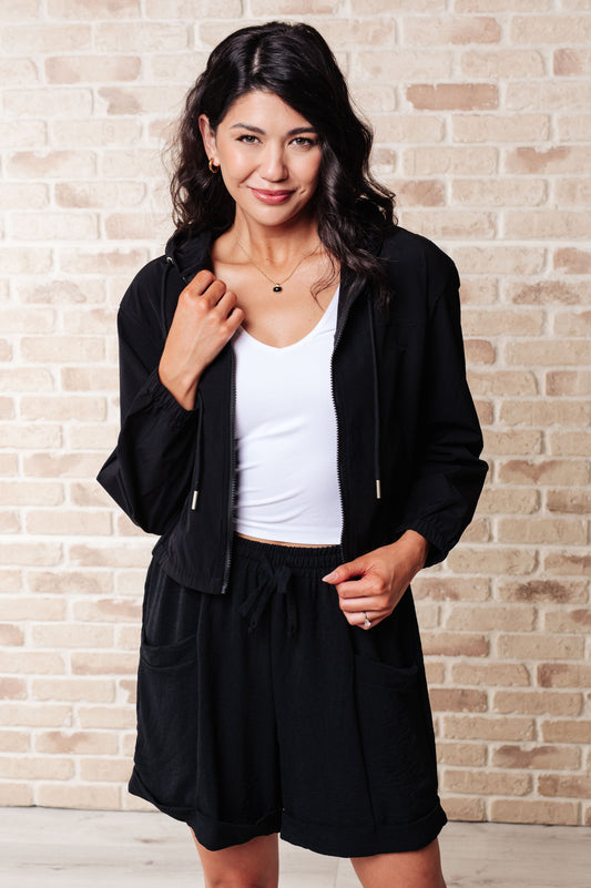 Black 100% Polyester jacket
Windbreaker Material
Front Zipper
Elastic Bottom Band
Functional Pockets
Hood with Drawstring
Windbreaker Material
True to Size