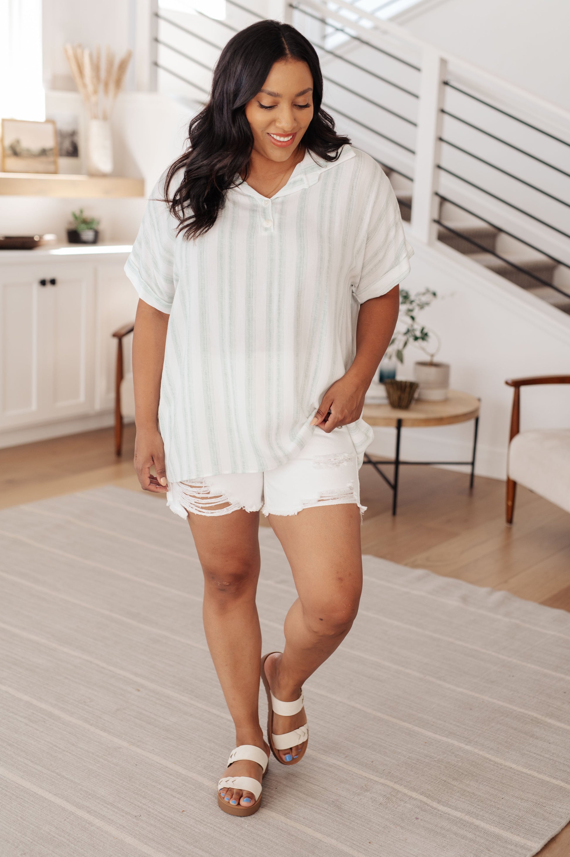 Striped Short Sleeve Top by Lovely Melody
Lightweight Woven
Faux Button Neckline
Fold Over Collar
Cuffed Dolman Sleeve
Gathered Back Seam
Comfort Fit
100% Rayon
True to Size