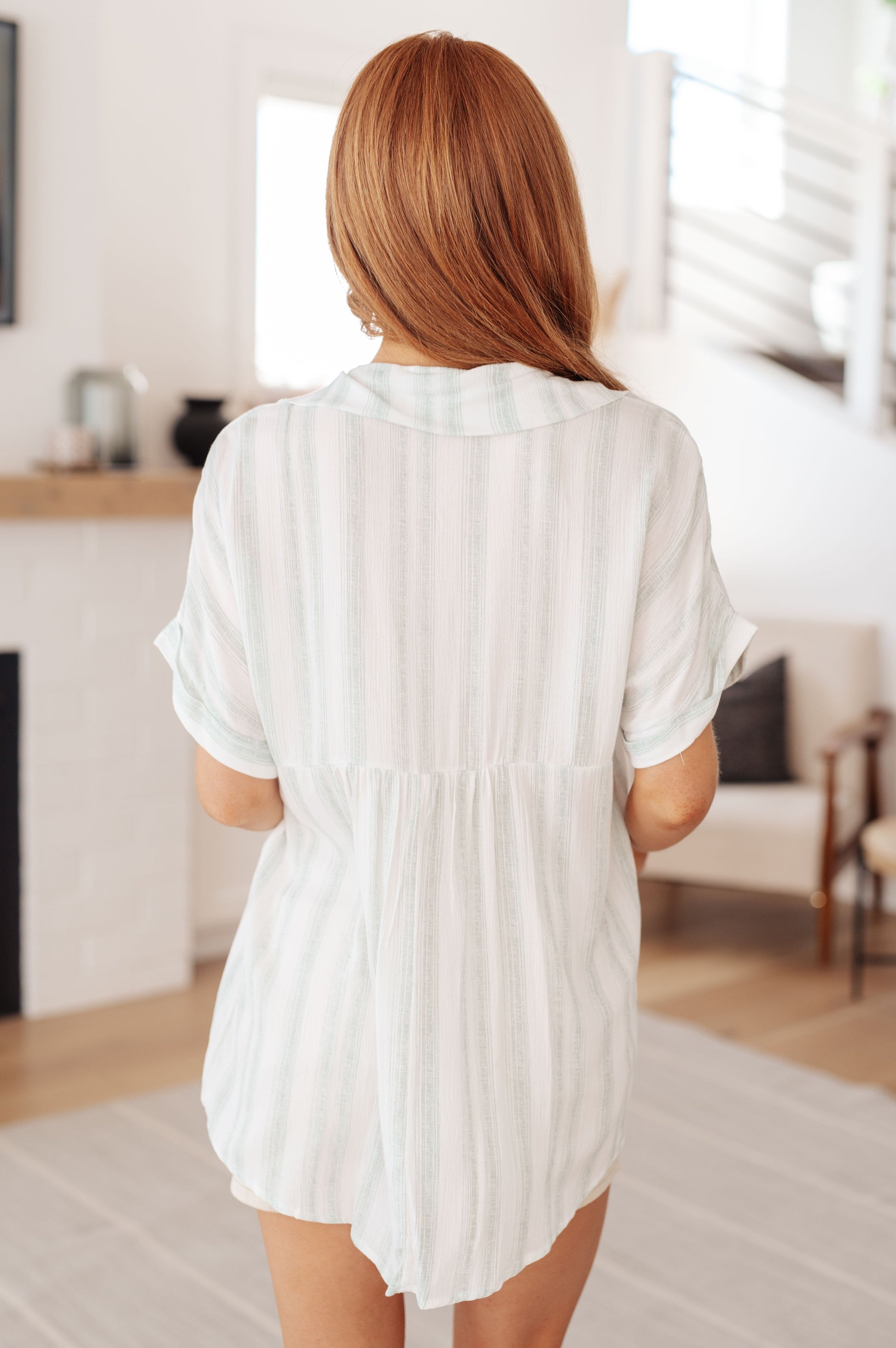 Striped Short Sleeve Top by Lovely Melody
Lightweight Woven
Faux Button Neckline
Fold Over Collar
Cuffed Dolman Sleeve
Gathered Back Seam
Comfort Fit
100% Rayon
True to Size
