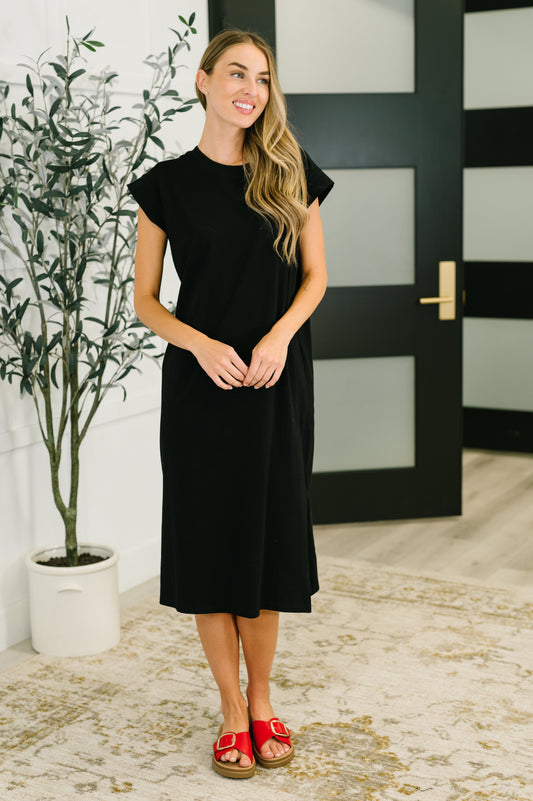 Casual cap sleeve dress in Black by Zenana
Jersey Knit
High Stretch
Banded, Round Neckline
Banded Sleeve Cuff
Side Slit
95% Cotton, 5% Spandex
True to Size