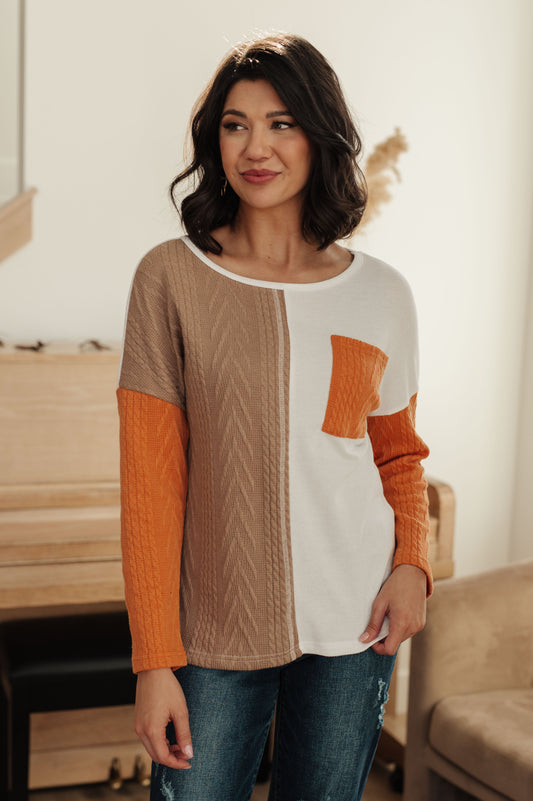 Textured Knit long sleeve color block top
Waffle Stitching
Dropped Shoulder
Patch Pocket
Color Block
75% Polyester, 20% Viscose, 5% Spandex
True to Size