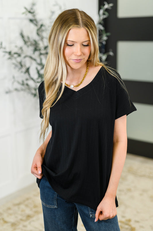 Basic V-Neck Ribbed Tee in Black
Ribbed Knit
High Stretch
Banded V-Neckline
Dolman Sleeve
Back Center Seam
70% Polyester, 25% Rayon, 5% Spandex
True to Size