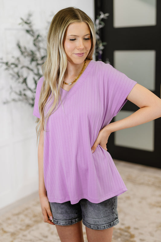 Basic V-Neck Ribbed Tee in Lavender
Ribbed Knit
High Stretch
Banded V-Neckline
Dolman Sleeve
Back Center Seam
70% Polyester, 25% Rayon, 5% Spandex
True to Size