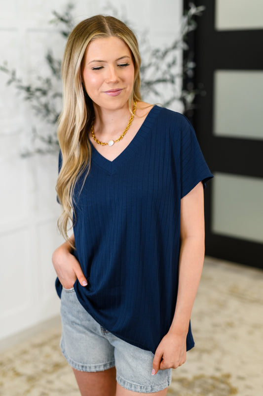 Basic V-Neck Ribbed Tee in Navy
Ribbed Knit
High Stretch
Banded V-Neckline
Dolman Sleeve
Back Center Seam
70% Polyester, 25% Rayon, 5% Spandex
True to Size