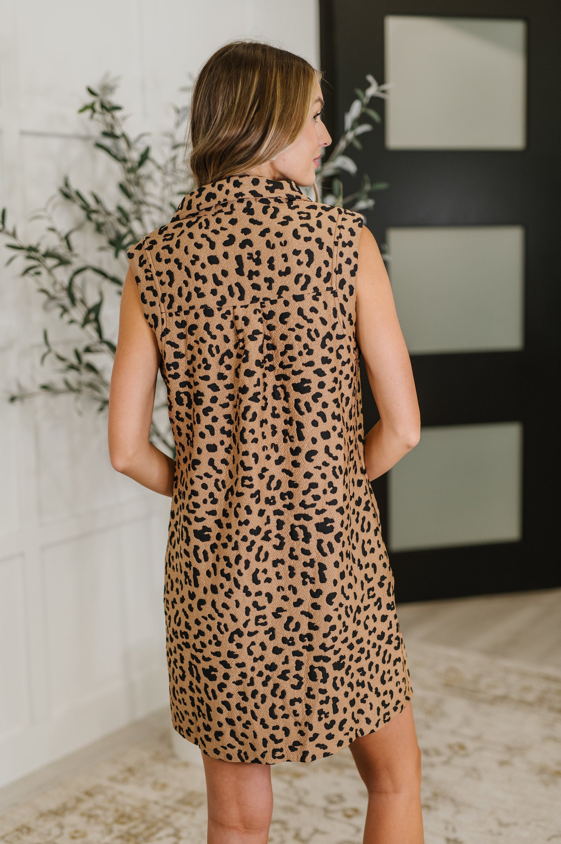 Sleeveless leopard print dress by One Eleven North