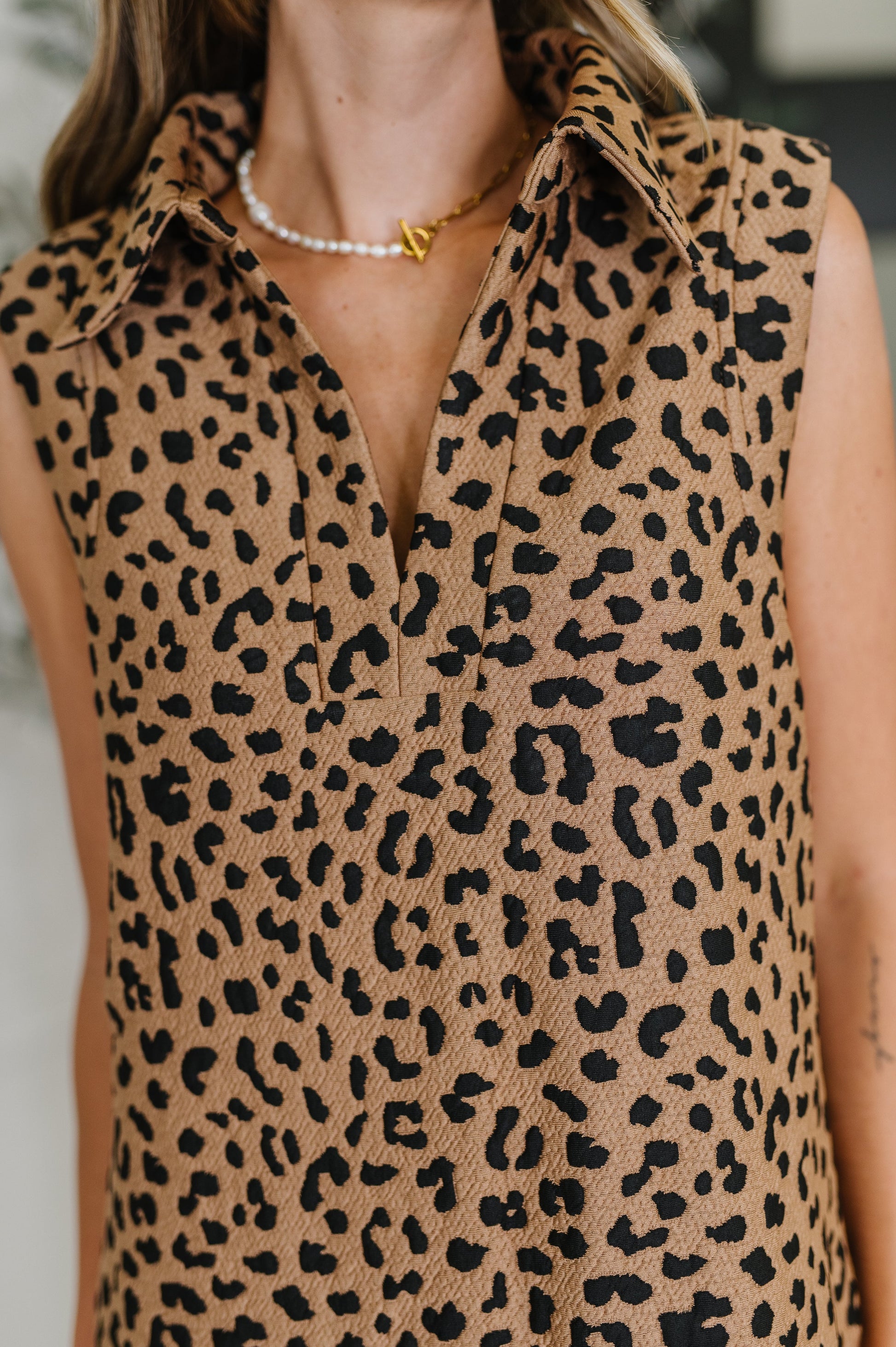 Sleeveless leopard print dress by One Eleven North