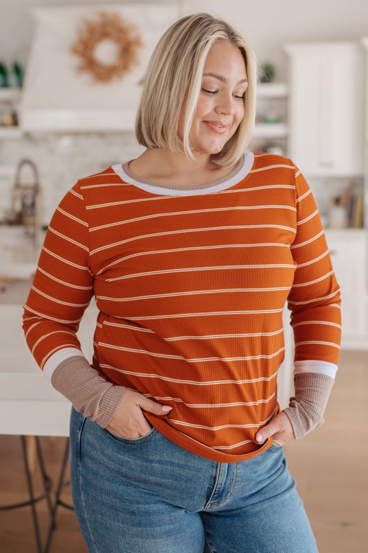 Burnt Orange Ribbed Jersey Knit
Color Blocked Sleeve
Slim Fit
95% Polyester, 5% Elastane
True to Size