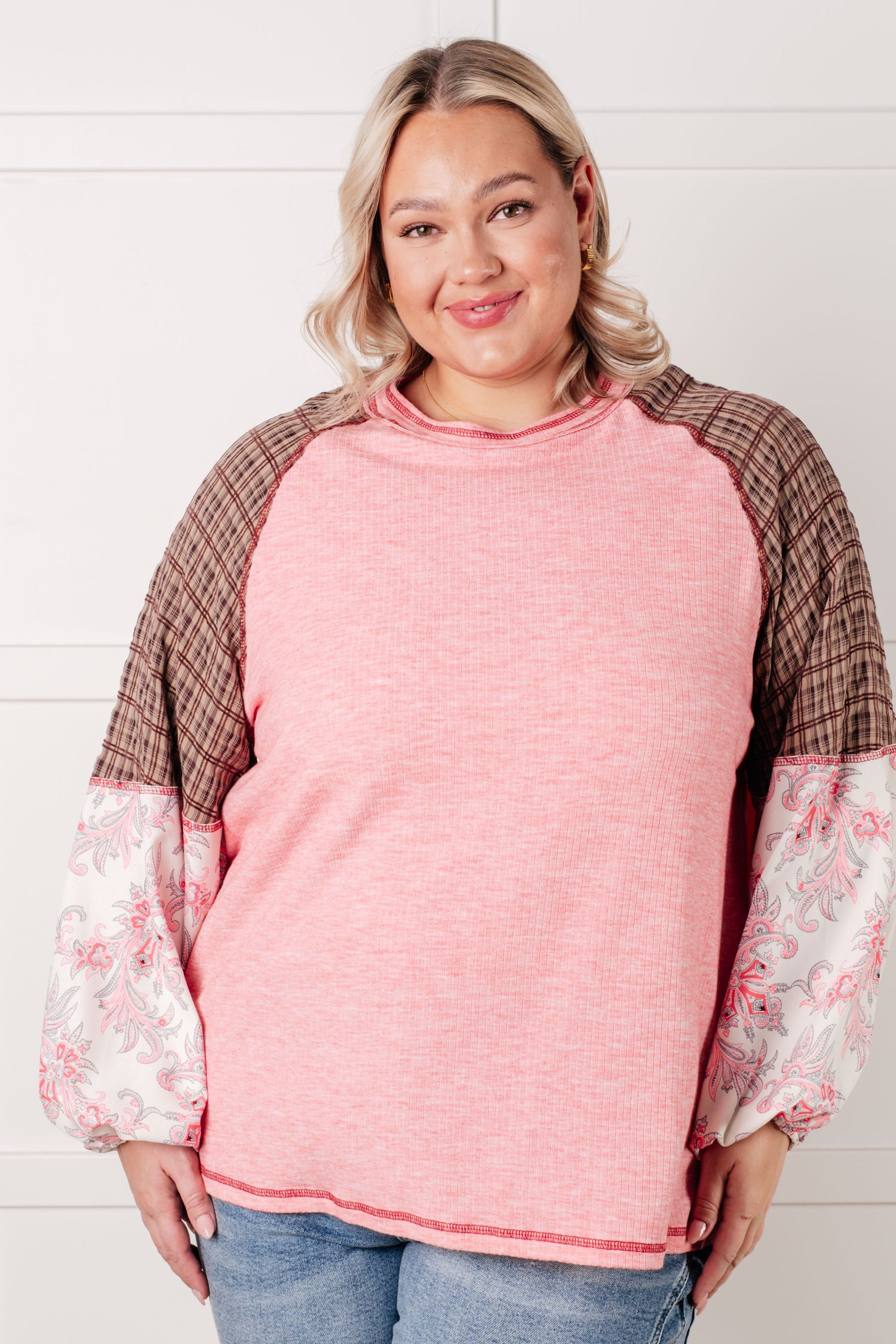 Knit Bodice long sleeve
Woven Contrast
Banded, Round Neckline
Raglan Balloon Sleeve
Cased Elastic Sleeve Cuff
Raw Edge Details
85% Polyester, 10% Viscose, 5% Elastane
True to Size