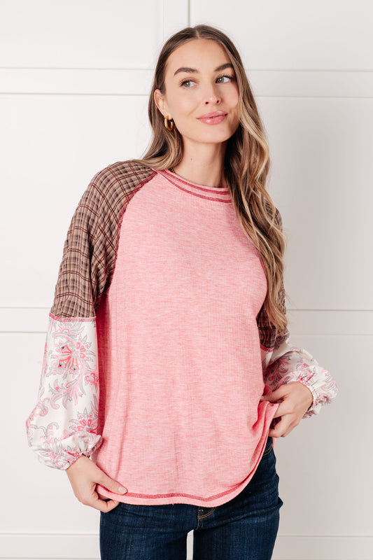Knit Bodice long sleeve
Woven Contrast
Banded, Round Neckline
Raglan Balloon Sleeve
Cased Elastic Sleeve Cuff
Raw Edge Details
85% Polyester, 10% Viscose, 5% Elastane
True to Size