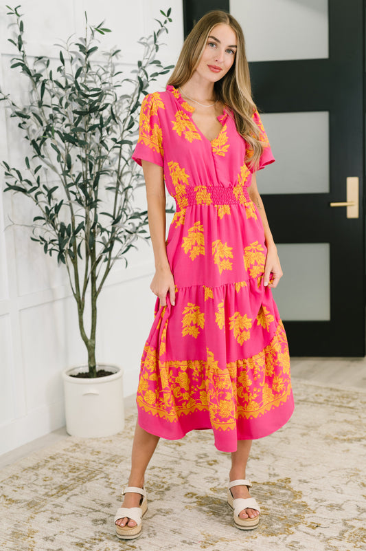 Pink floral, short sleeve dress by Haptics 
Lightweight Woven
No Stretch
V-Neckline
Flutter Sleeve
Smocked Elastic Waistband
Functional Side Pockets
Ruffle Details
Gathered Tiers
100% Polyester
True to Size