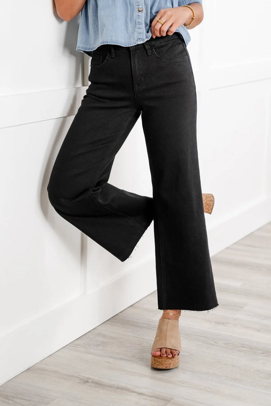 Black Denim kick flares by Mica