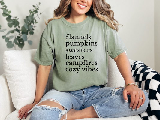 This Flannels Pumpkins graphic tee comes in Green, Red, Chocolate, and Yam Comfort Colors.